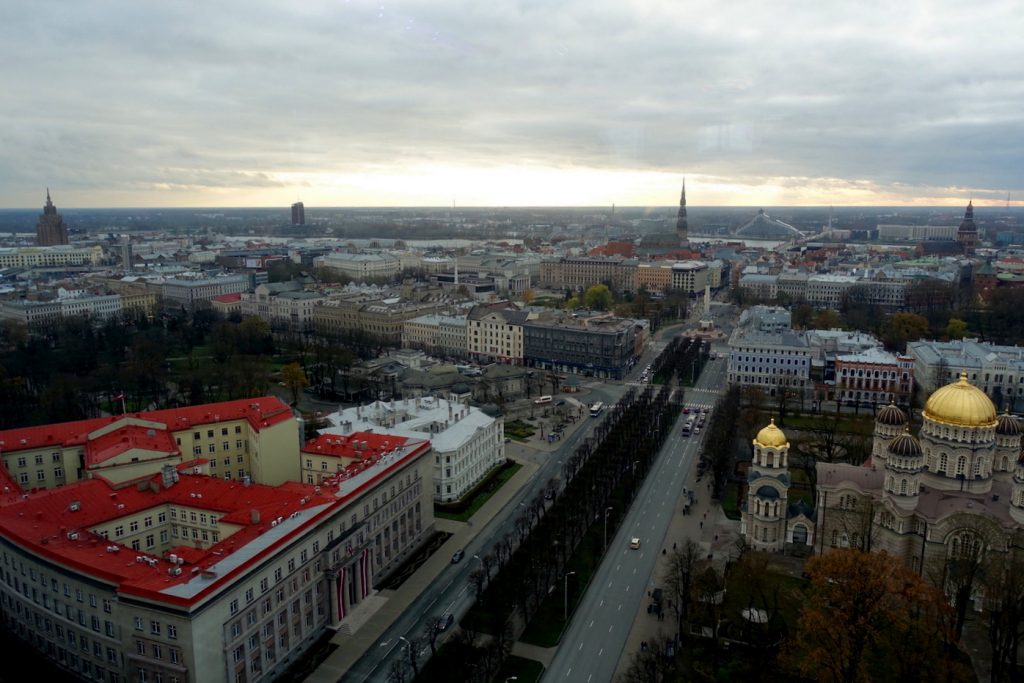 A view of Riga town from the top of a building at sunset time.