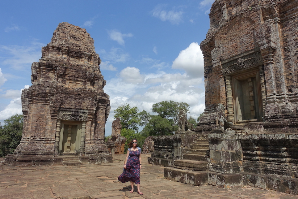 Pre Rup temple buildings and Pilar posing with a blue dress