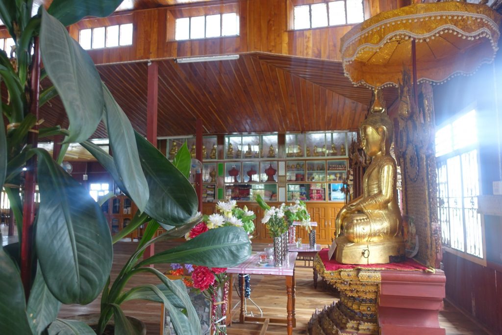 A buddha golden image inside the Cat temple in Inle lake