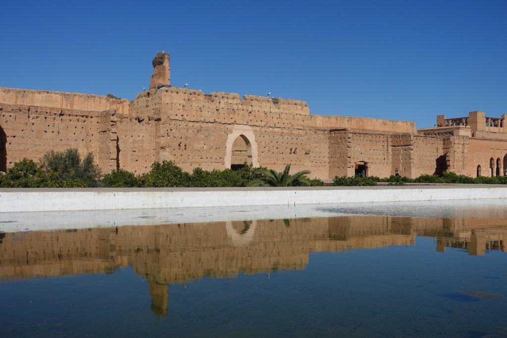 A view of the Badi palace and the reflection of the castle on the pond in the interior garden