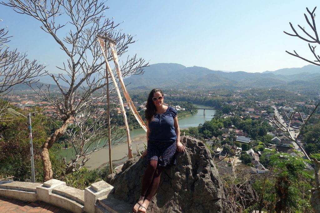 Pilar on top of Mount Phousi and a view of the river Nam Khan river behind and Luang Prabang