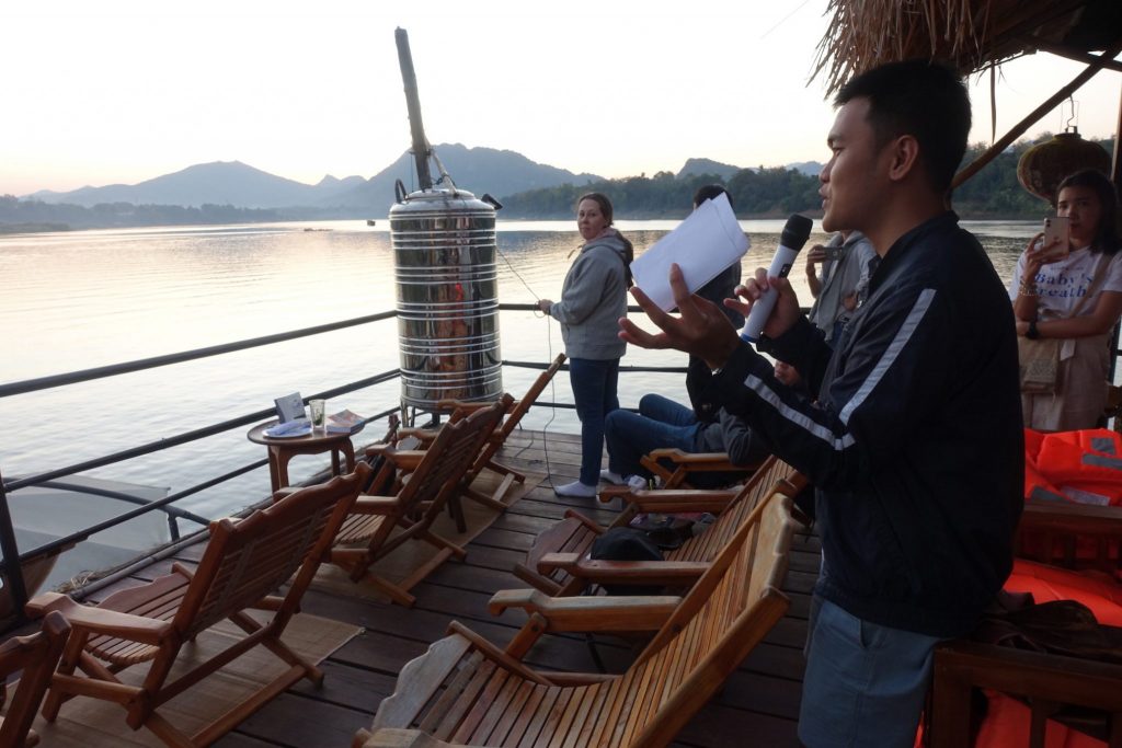 Wish fullfilling ceremony during the Mekong sunset tour on the boat