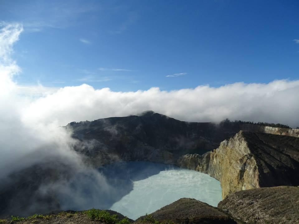 Kelimutu Twin lakes with some clouds at sunrise time. Kelimutu volcano mouths at sunrise are spectacular.