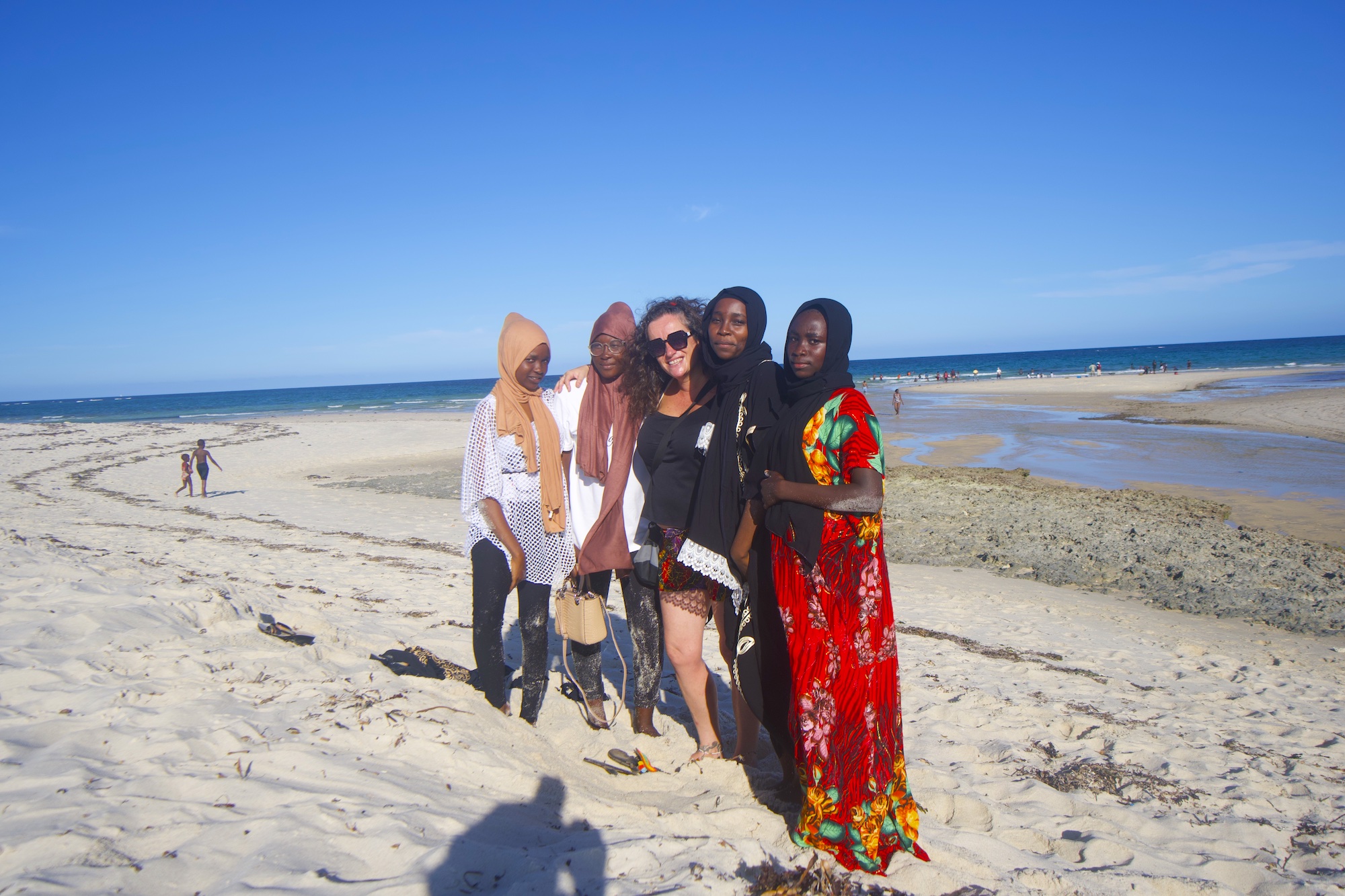 Pilar with a group of Kenyan women at Diani beach