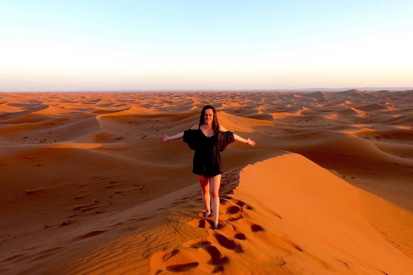 Pilar at the top of one of the Erg Chigaga dunes