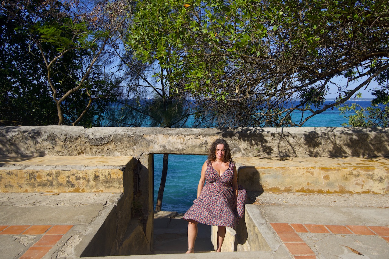 Pilar at the stairs close to the sea water at the edge of the fort in Prison Island