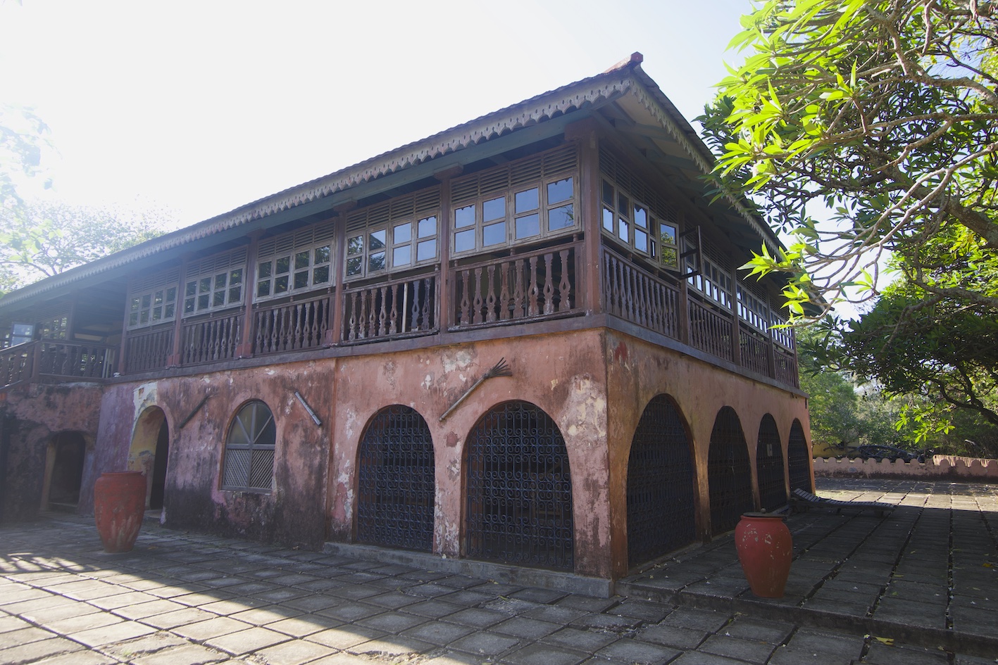 A red colonial style building in prison island Zanzibar