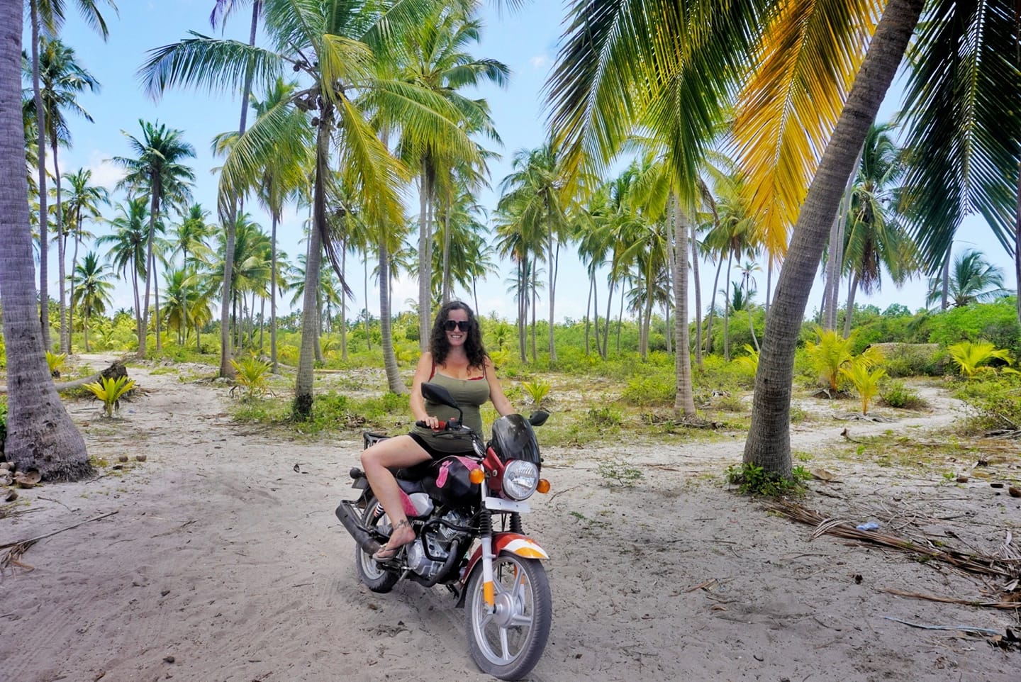 Pilar on a motorbike in Mafia island in Kanga beach