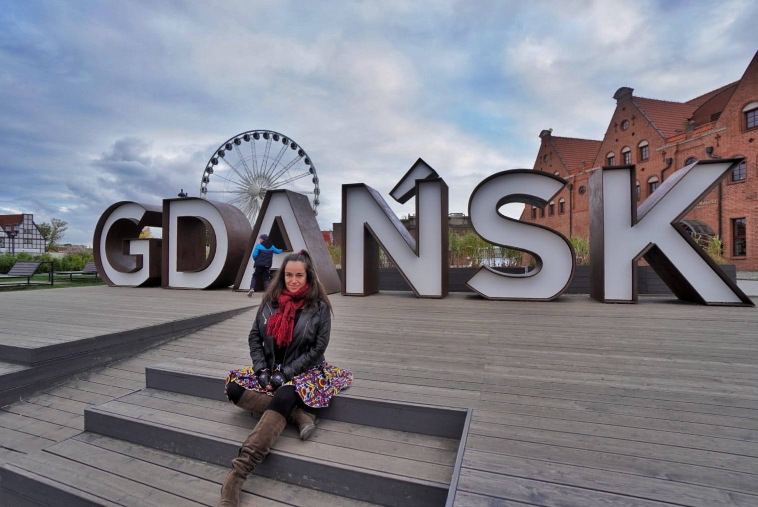 Pilar with the fairies wheel on the back and the Gdansk city letters