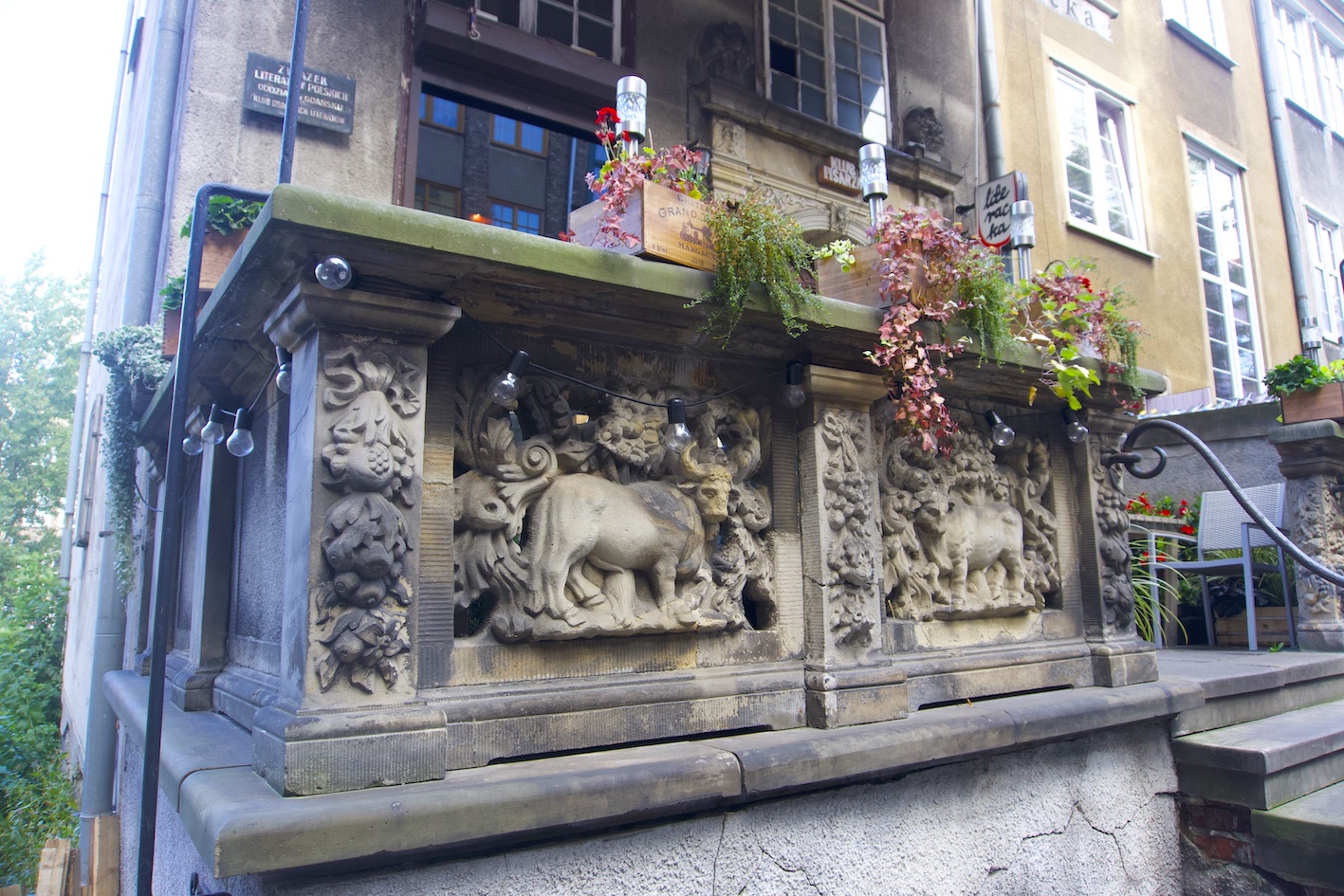 Mariacka street beautiful balcony engravings