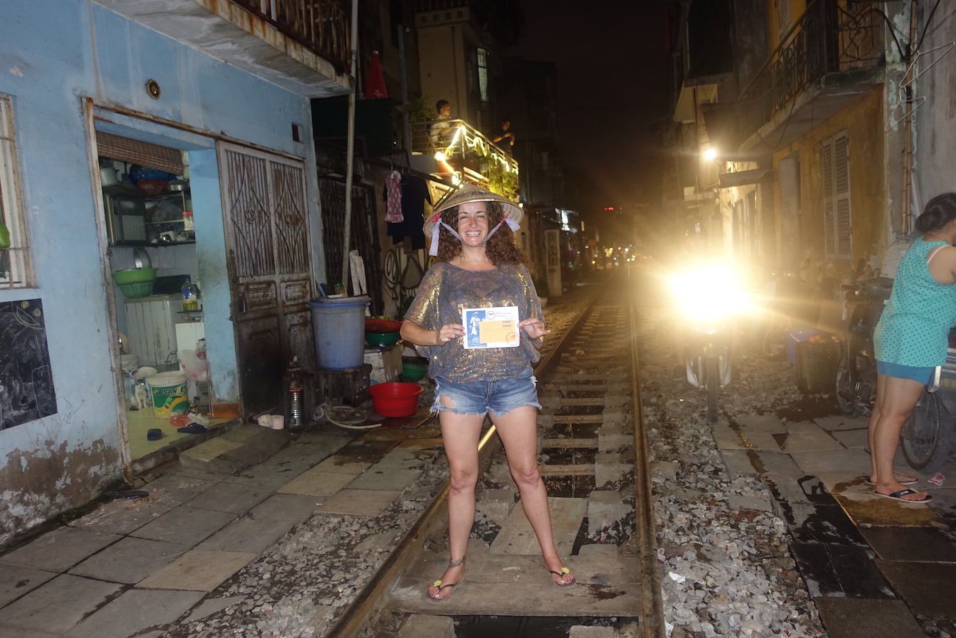 Pilar with pass of train certificate in Hanoi Train Street
