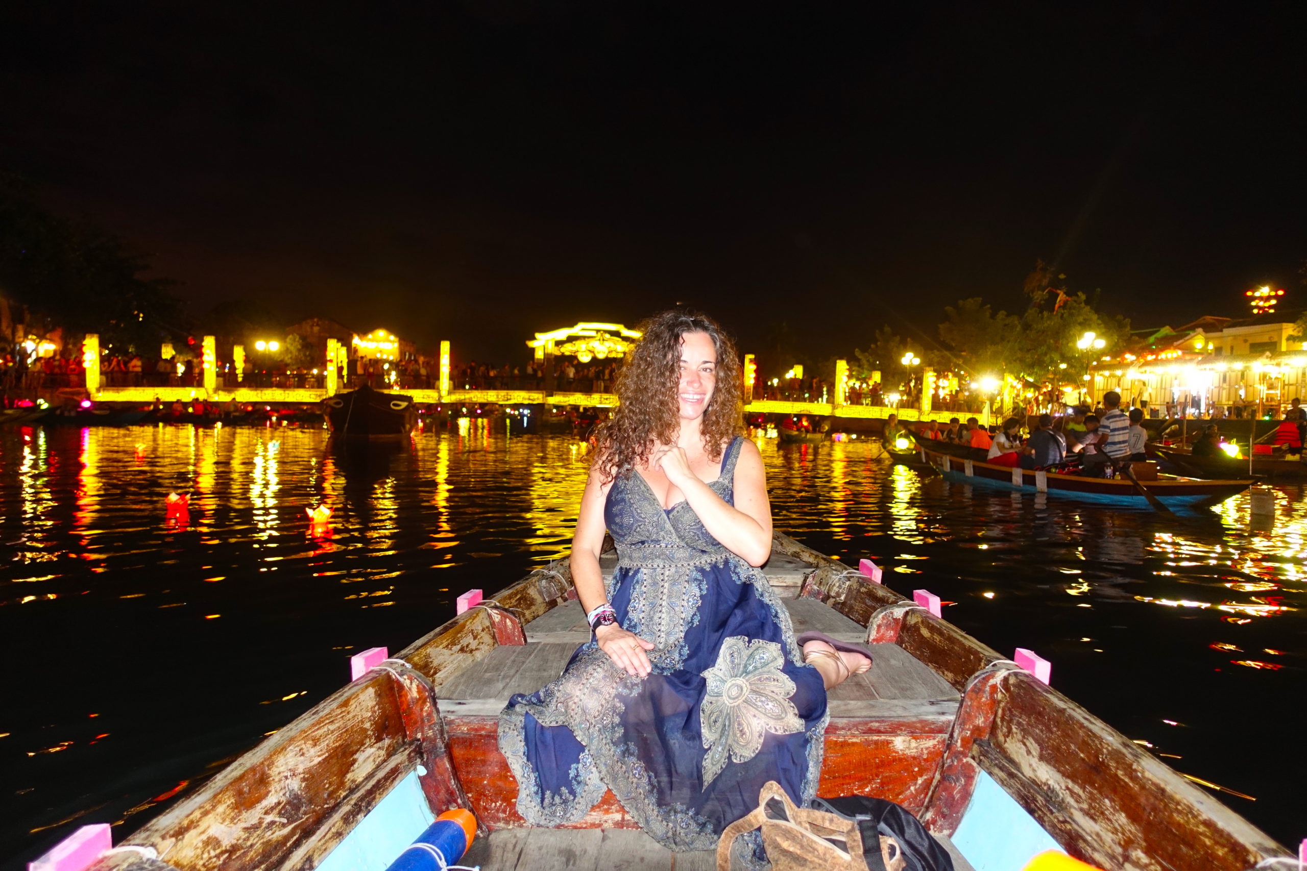 Pilar on the boat tour ride at night in Hoi An
