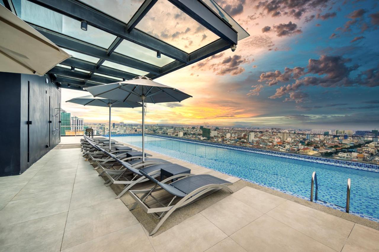 Stunning view of the city and the super long swimming pool of the Lux city hote on Phnom Penh