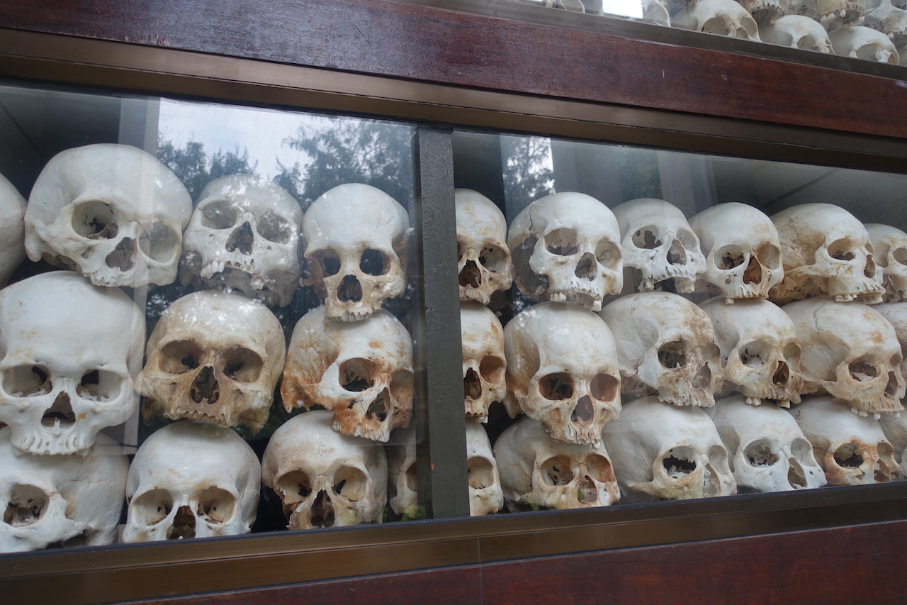 Some skulls at the entrance of the Killing fields in the outskirts of Phnom Penh