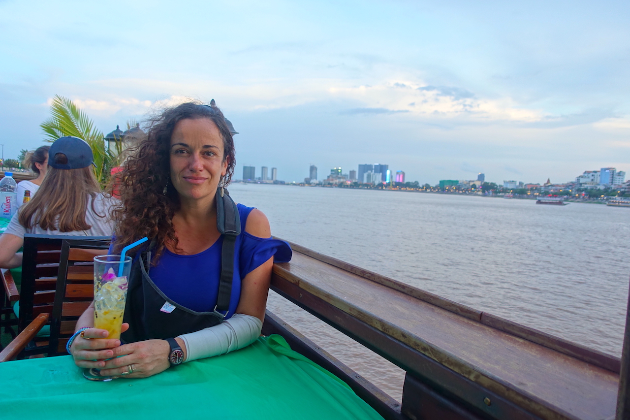 Pilar with a cocktail at the Phnom Penh sunset tour