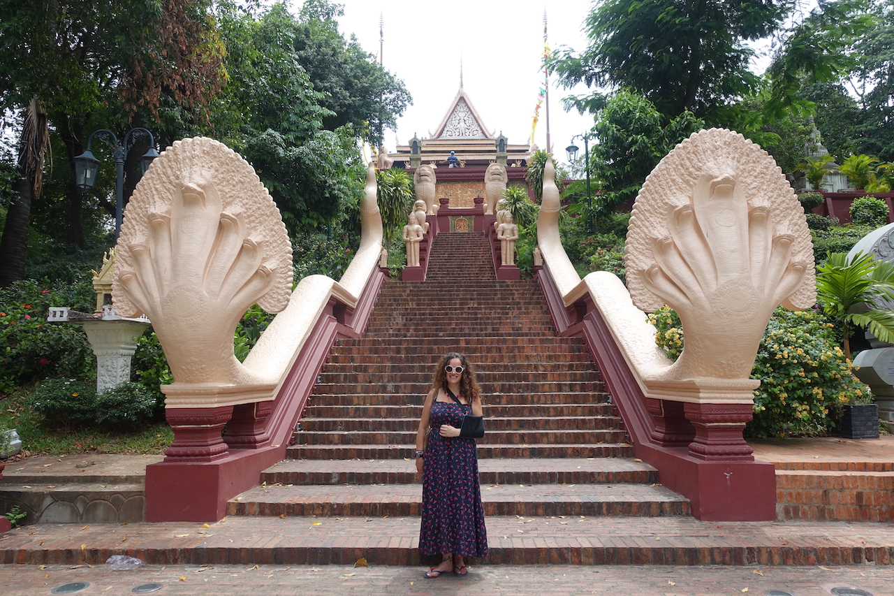 Pilar at the entrance stairs at the Wat Phnom temple