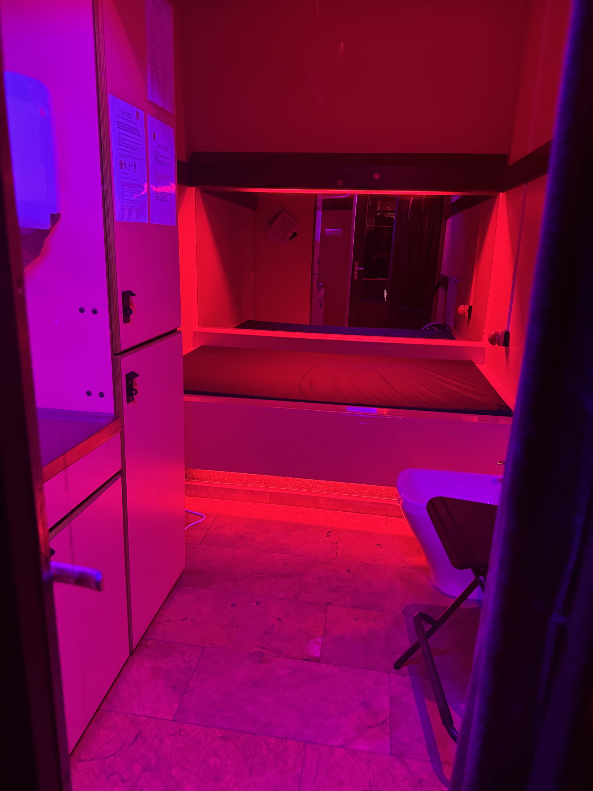 Interior of a typical red-lit room used in the Amsterdam Red Light District window system