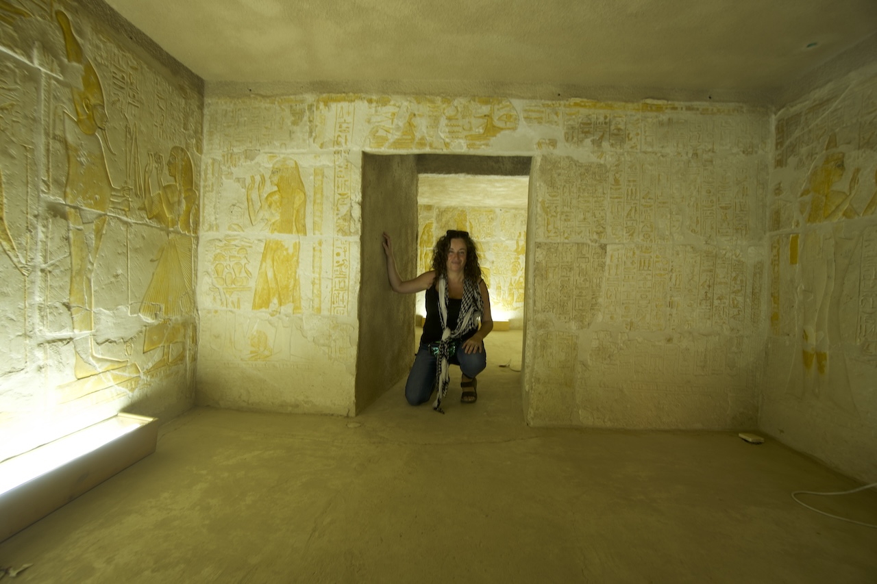 Interior of decorated tomb chamber in Saqqara with yellow walls