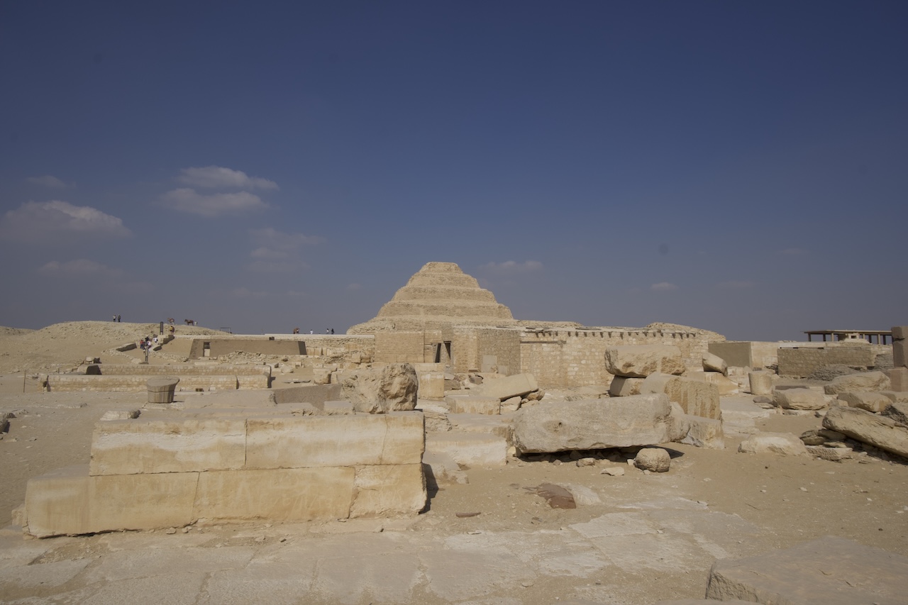 Desert view of Saqqara necropolis with pyramids and ruins