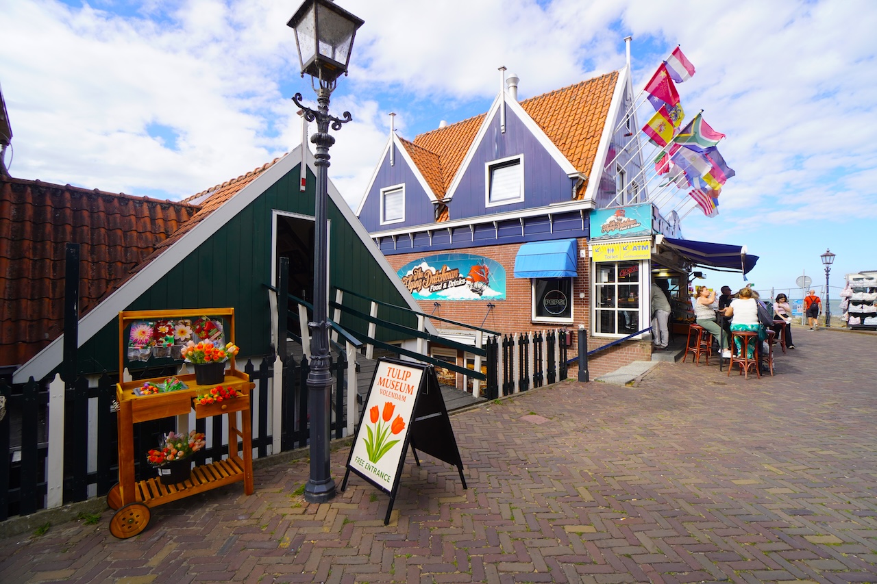 Tulip Museum and traditional Dutch buildings near the harbour in Volendam